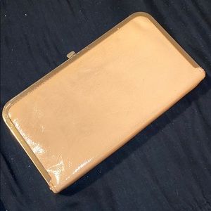 Tan and gold clutch